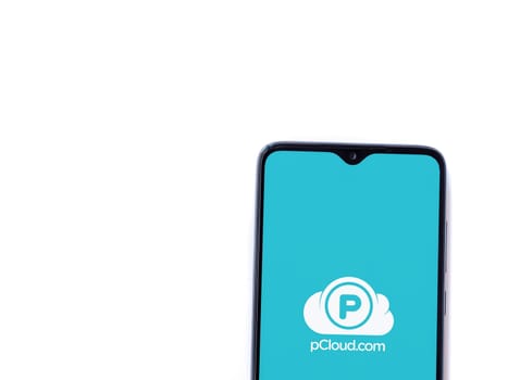 Lod, Israel - July 16,2023: pCloud app launch screen on smartphone on white background. Top view flat lay with copy space.