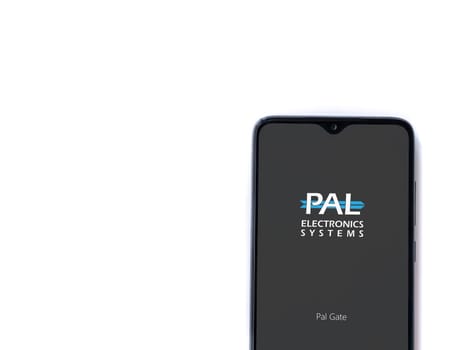 Lod, Israel - July 16,2023: PalGate app launch screen on smartphone on white background. Top view flat lay with copy space.