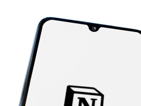 Lod, Israel - July 16,2023: Notion app launch screen on smartphone on white background. Top view flat lay with copy space.