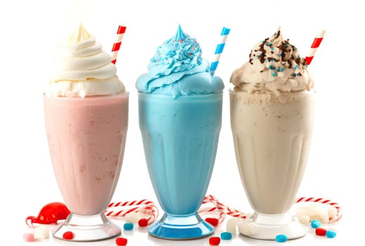assortment of milkshakes with different flavors isolated on white background .Generative AI