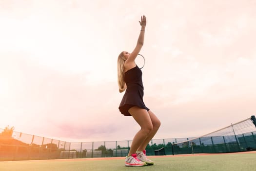 Tennis tournament. Female player at clay tennis court