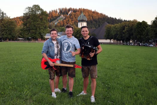 The village rockers (brothers Tobias,Markus and Philipp Thomann) at the guest performance in Hinterzarten on the occasion of the anniversary weekend