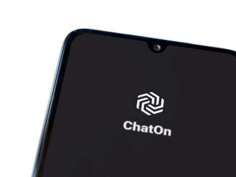 Lod, Israel - July 16,2023: ChatOn app launch screen on smartphone on white background. Top view flat lay with copy space.