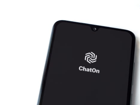 Lod, Israel - July 16,2023: ChatOn app launch screen on smartphone on white background. Top view flat lay with copy space.