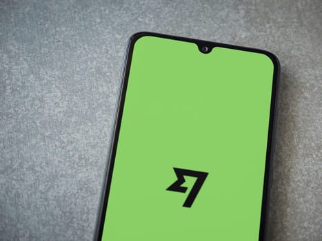 Lod, Israel - July 16,2023: Wise app launch screen on smartphone on ceramic stone background. Top view flat lay with copy space.
