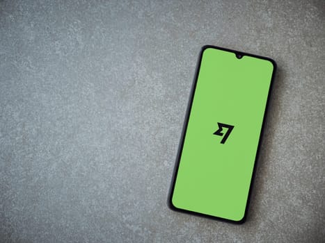 Lod, Israel - July 16,2023: Wise app launch screen on smartphone on ceramic stone background. Top view flat lay with copy space.