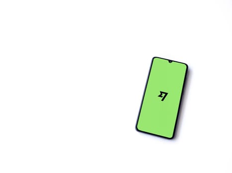 Lod, Israel - July 16,2023: Wise app launch screen on smartphone on white background. Top view flat lay with copy space.