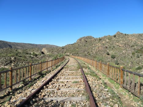 iron road bridges metal rail light at the end of the tunnel train transport
