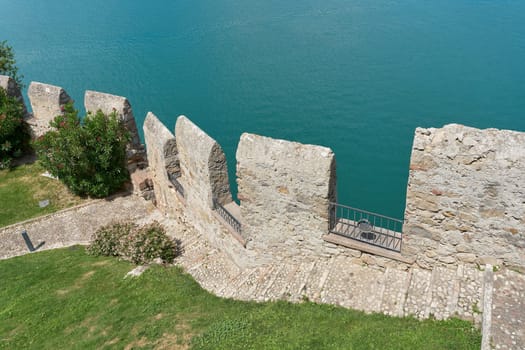 View from the Scaligerburg, Scaliger Castle, Castello Scaligero in Malcesine in Italy to the terrain below and Lake Garda