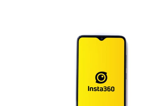 Lod, Israel - July 16,2023: Insta360 app launch screen on smartphone on white background.. Top view flat lay with copy space.