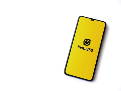 Lod, Israel - July 16,2023: Insta360 app launch screen on smartphone on white background.. Top view flat lay with copy space.