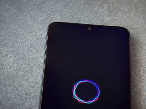 Lod, Israel - July 16,2023: Imagine - AI Art Generator app launch screen on smartphone on ceramic stone background.. Top view flat lay with copy space.