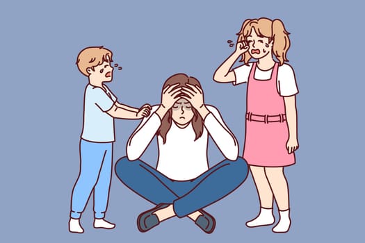 Crying children near upset mother suffering from financial problems and bankruptcy or husband leaving family. Little girl and boy are stressed with mother because of fathers accident