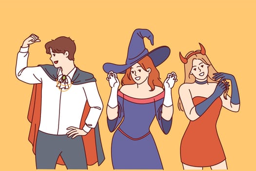 People in halloween party costumes invite you to visit festive october festival or nightclub. Man in dracula clothes and woman in image of devil or witch for halloween celebration.