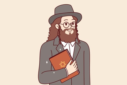 Jewish man with long hair and beard holds torah book with star of david on cover. Human jewish in national clothes of religious jews smiles and calls to accept judaism or visit city of jerusalem