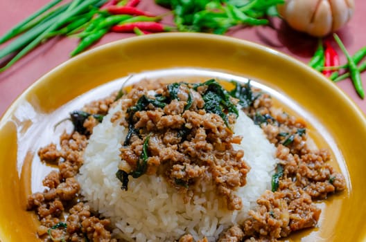 Minced pork with basil over rice is a Thai food that is popular among Thai people because it is delicious and easy to eat