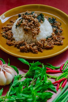 Minced pork with basil over rice is a Thai food that is popular among Thai people because it is delicious and easy to eat