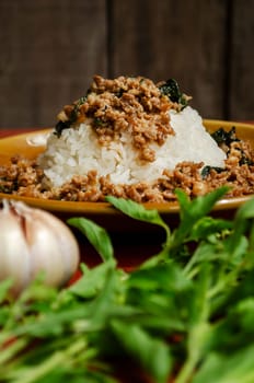 Minced pork with basil over rice is a Thai food that is popular among Thai people because it is delicious and easy to eat