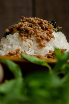 Minced pork with basil over rice is a Thai food that is popular among Thai people because it is delicious and easy to eat