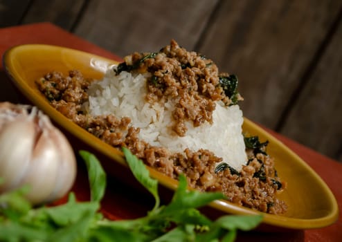 Minced pork with basil over rice is a Thai food that is popular among Thai people because it is delicious and easy to eat