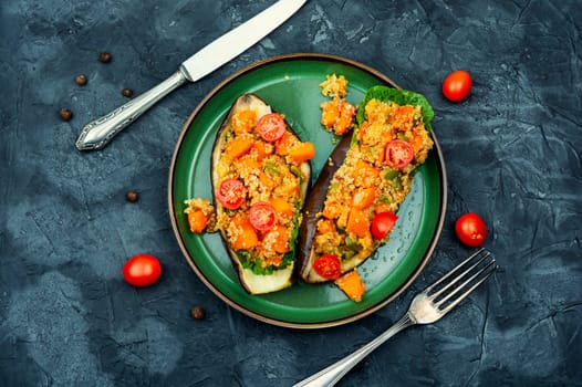 Grilled eggplant stuffed with pumpkin and quinoa. Vegetarian food recipe