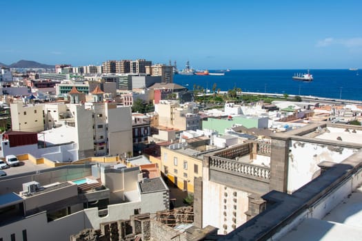 Panoramic view from above of the capital Las Palmas Gran Canaria in Spain with part of the Santa Ana Cathedral and views to the harbor and the sea