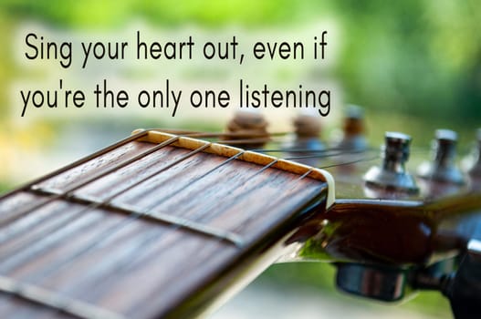 Motivational and inspirational quote - Sing your heart out, even if you're the only one listening. With Guitar background