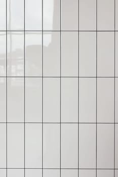 White glossy vertical ceramic rectangle tiles seamless pattern texture. Home interior, bathroom and kitchen wall repeat texture