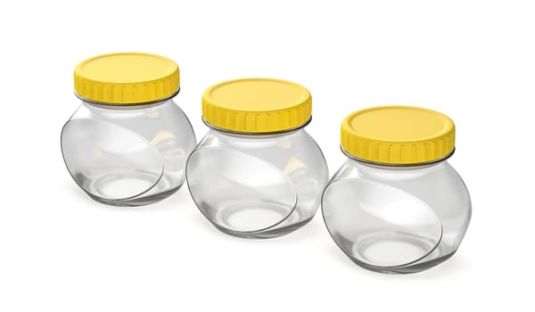 Three empty oval glass jars with yellow plastic lids on white background