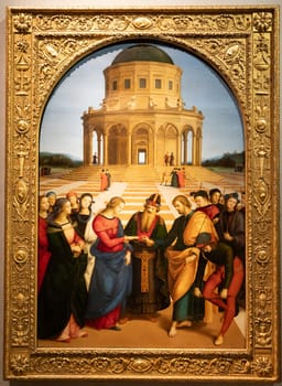 Milan, Italy - 23 September 2023: Brera antique painting museum. Marriage of the Virgin, by Raffaello Sanzio - Raphael, 1504