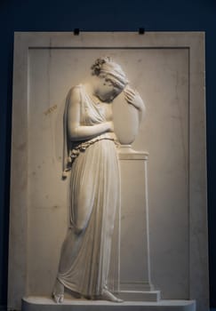 Possagno, Italy - June 2022: funeral sculpture by Antonio Canova. Marble memorial on tombstone