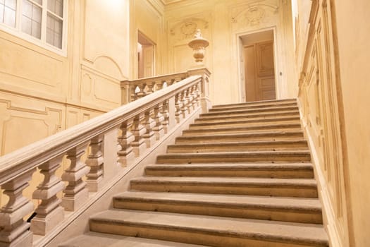 Turin, Italy - April, 2023: luxury baroque staircase, elegant vintage interior