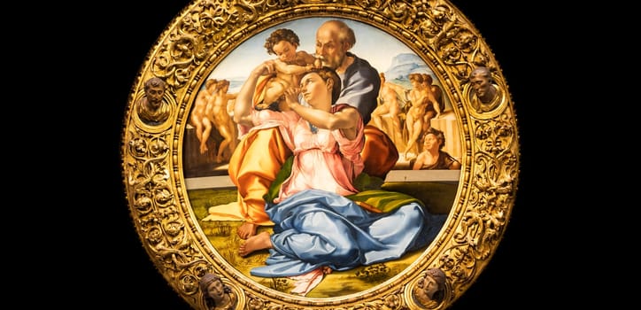 Florence, Italy - Circa August 2021: Holy Family with the Young St. John Baptist - named Doni Tondo - by Michelangelo Buonarroti, 1507