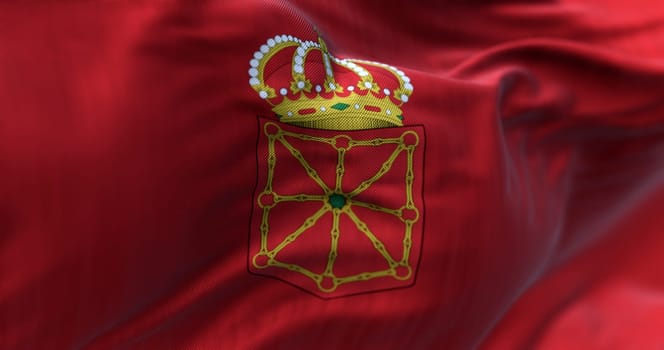 Close-up of Navarre flag waving. Autonomous community of Spain. Golden chains arranged against a red background. 3d illustration render. Selective focus. Close-up. Fluttering fabric