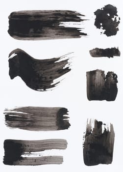 Watercolor brush stroke of black paint, on a white background. Set