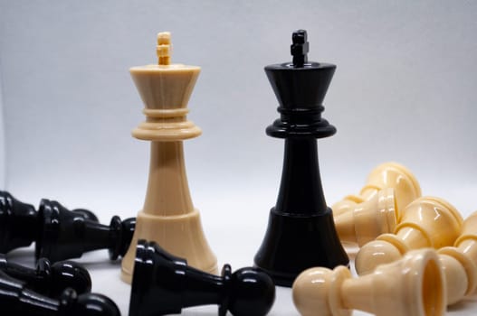 Selective view of chess pawn moving toward for battle. Strategy and tactic concept.