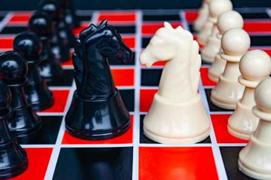 Selective view of chess pawn moving toward for battle. Strategy and tactic concept.