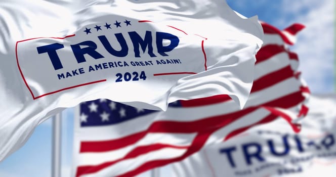 Arlington, US, oct. 22 2023: Donald Trump 2024 presidential campaign flags waving with american flags waving together. 2024 US presidential election. Illustrative editorial 3d illustration render