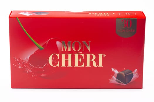 HUETTENBERG, GERMANY - SEPTEMBER 24 -2023: Box of Ferrero Mon Cheri chocolate pralines. Mon Cheri is an internationally known brand name of the Italian Ferrero company for a chocolate confectionery