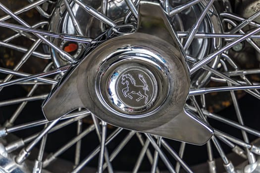 WETTENBERG, HESSE, GERMANY - 07 - 28 - 2023: A detail of a wheel of a Ferrari 250 GT Cabriolet Pinin Farina is on display during the traditional Car Shoew in Krofdorf-Gleiberg near Giessen.