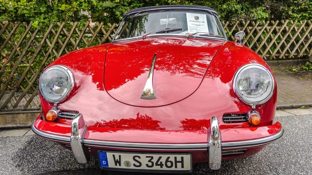 WETTENBERG, HESSE, GERMANY - 07 - 28 - 2023: PORSCHE 356 Super 90 Roadster classic vintage sports car on a car show in Krofdorf-Gleiberg near Giessen in Hesse.
