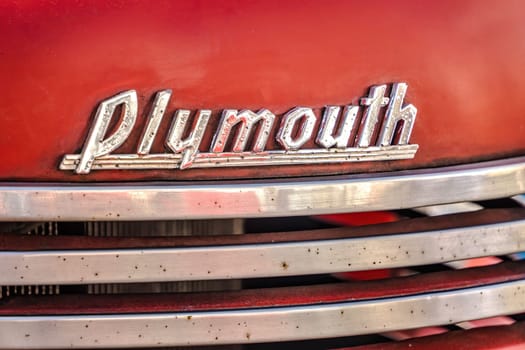 WETTENBERG, HESSE, GERMANY - 07 - 28 - 2023: PLYMOUTH Truck Car Lettering in Detail on a Car Show Golden Oldies in Krofdorf-Gleiberg, near Giessen, Hesse.