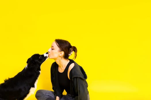 Friendship between people and animals, a studio shot, love, tender, warm feeling and emotion