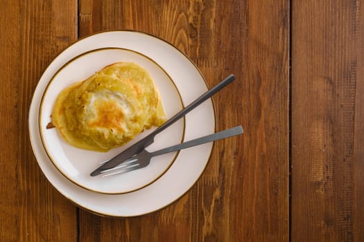 Top view of fried apple pancakes on a plate
