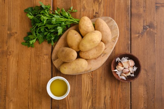 Top view of ingredients for potato pancakes on a table