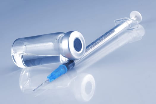 A medical syringe and an ampule bottle for vaccination