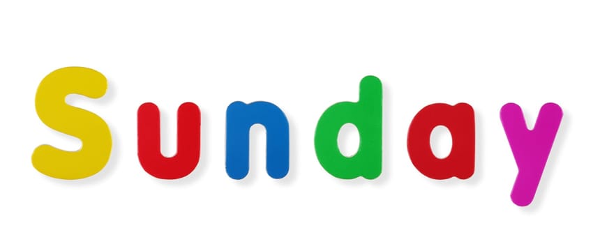 A Sunday word in coloured magnetic letters on white with clipping path to remove shadow