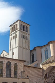 Detailed view of the Tower of Basilica of Saint Francis of Assisi. Umbria. Italy. Vertically.