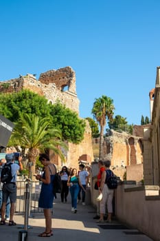 Sicily, Taormina, Italy - 28 September 2023. Greek Theatre. The Greek Theatre Street (Via Teatro Greco) leads from the Abbey Square (Piazza Badia) directly to the Greek Theatre of Taormina.