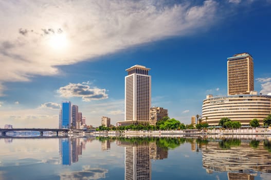 The Great Nile river and the banks of Cairo with fashionable buildings, Egypt.